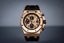 Audemars Piguet Royal Oak Offshore Chronograph 42mm Rose Gold 26470OR with black rubber strap and intricate dial.