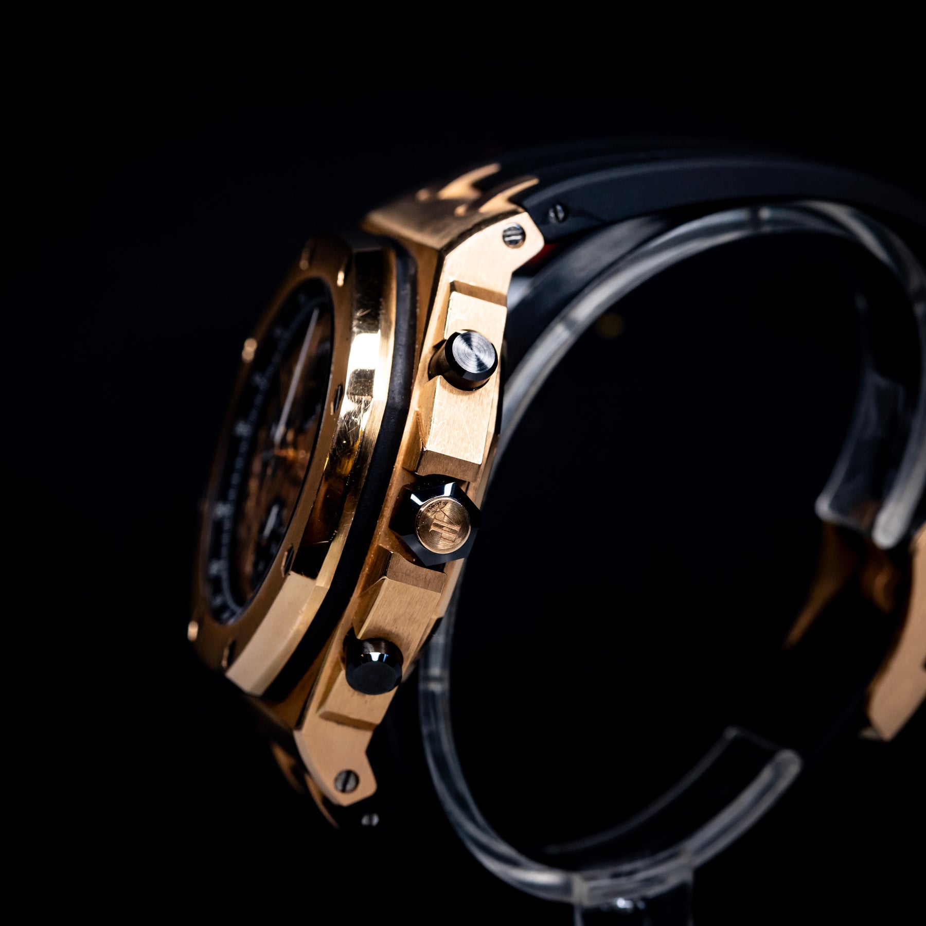 Audemars Piguet Royal Oak Offshore Chronograph 42mm Rose Gold side view showcasing its elegant design and features.