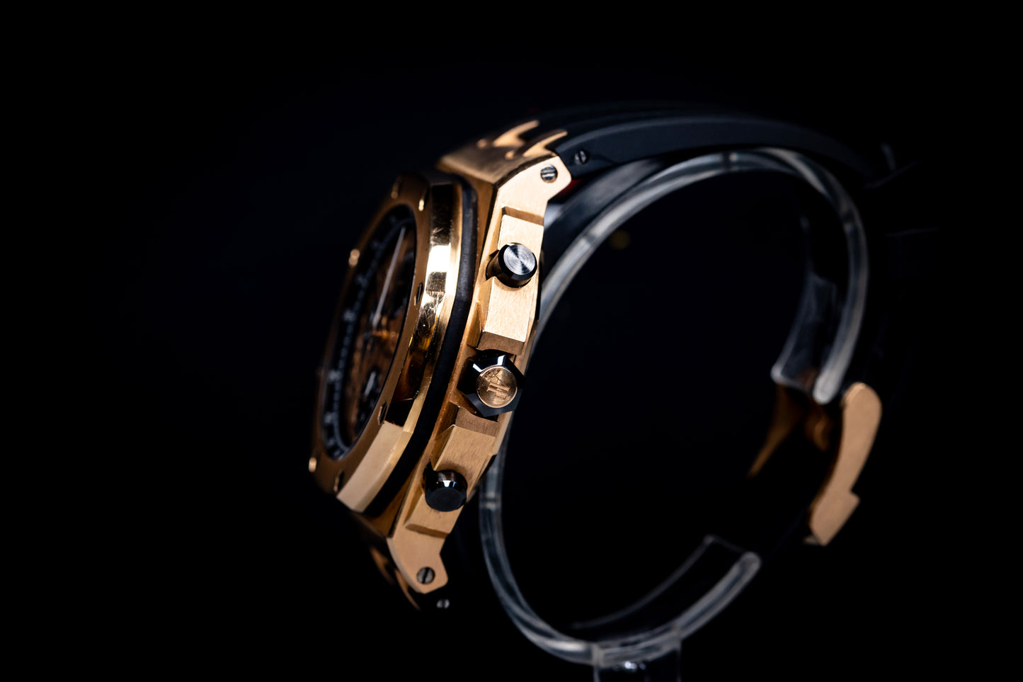 Audemars Piguet Royal Oak Offshore Chronograph 42mm Rose Gold side view showcasing its elegant design and features.