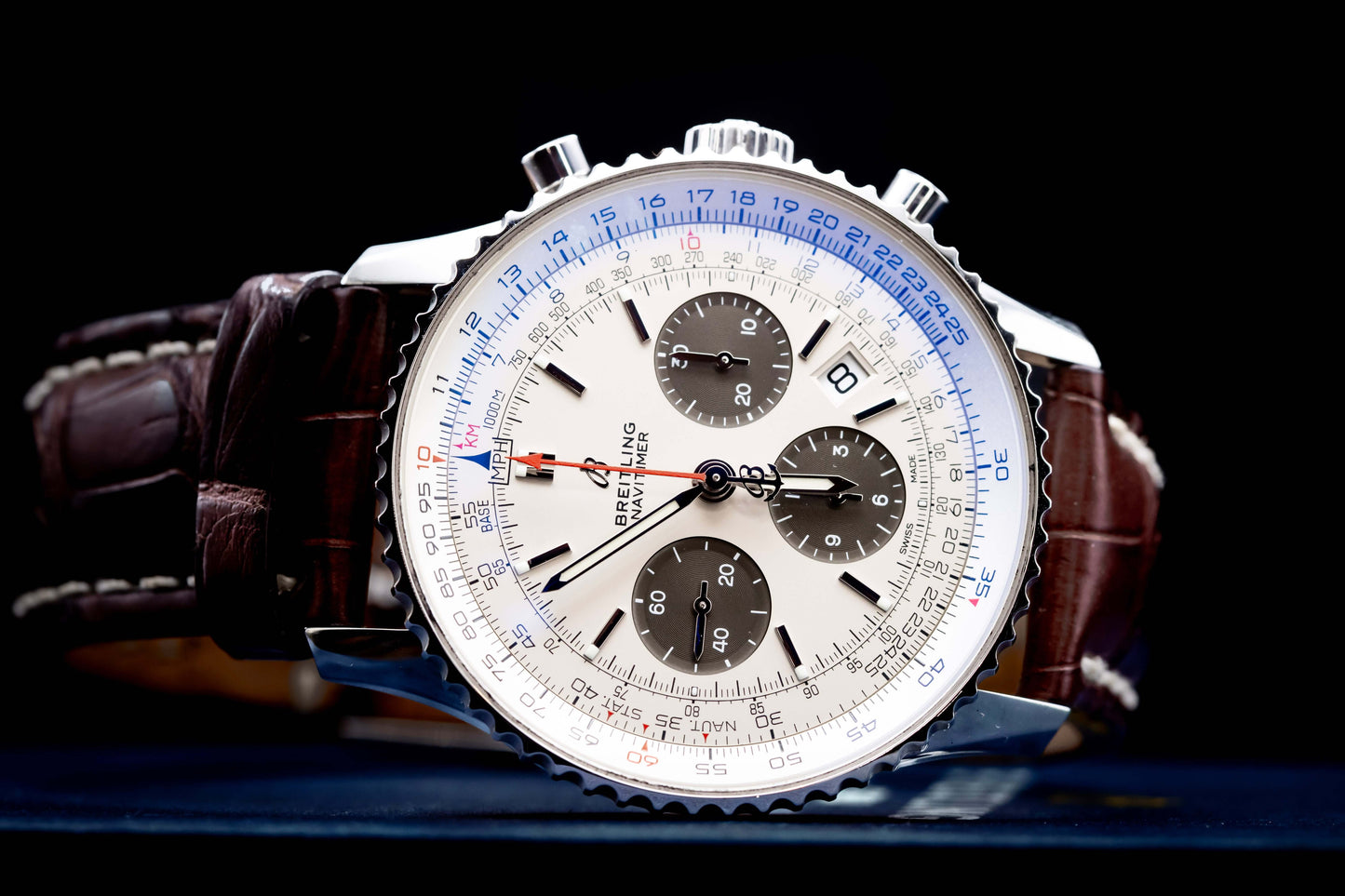 Breitling Navitimer 1 B01 Chronograph 43mm  Ref:AB0121211G1P1 watch with silver dial and brown leather strap.