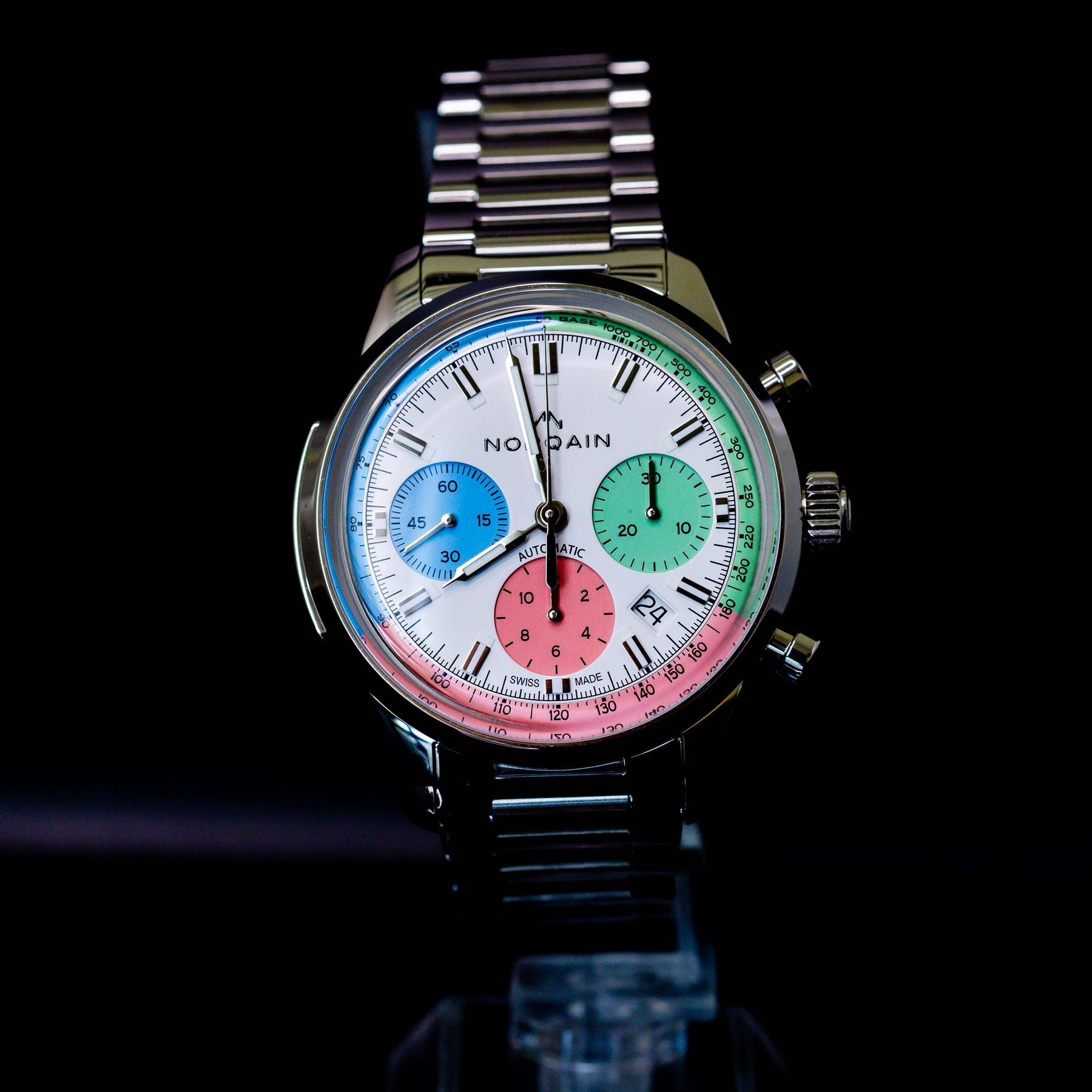 Norqain Freedom 60 Chrono Ice Cream Limited Edition with colorful dials and a stainless steel bracelet.