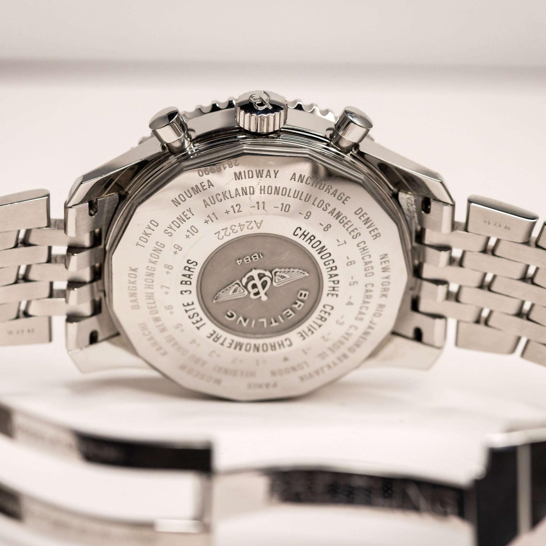 Back view of Breitling Navitimer World Chronograph GMT 46 mm showing stainless-steel case and intricate details.
