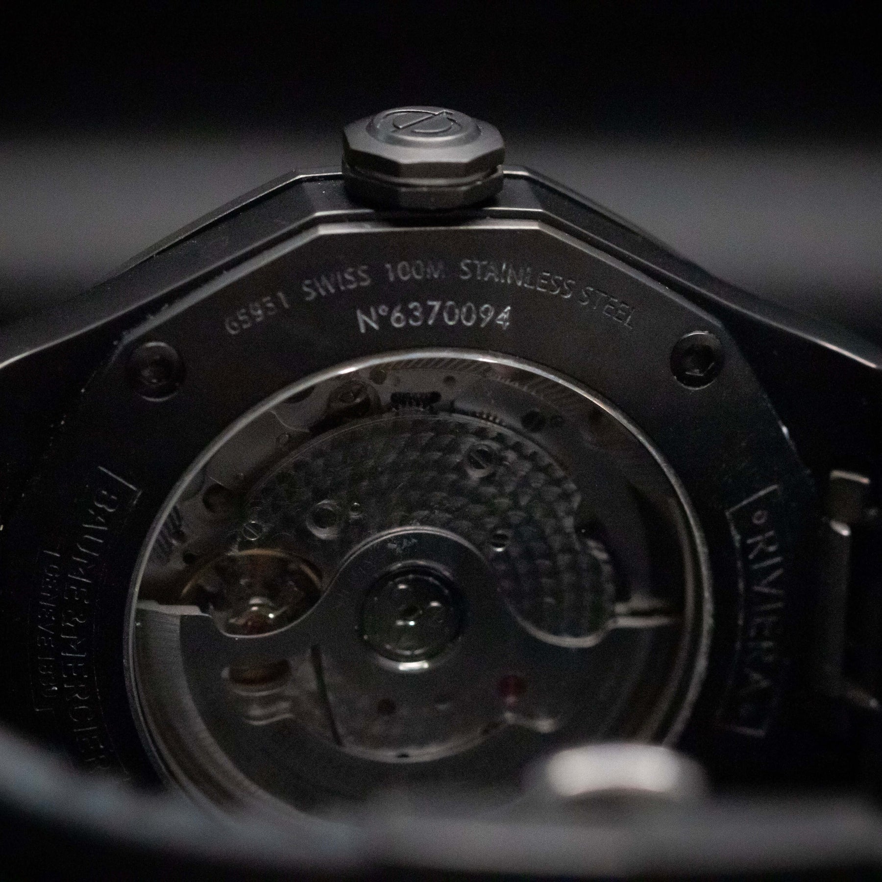 Baume & Mercier Riviera Automatic Skeleton watch Black-Steel ADLC back view showcasing intricate movement and design.