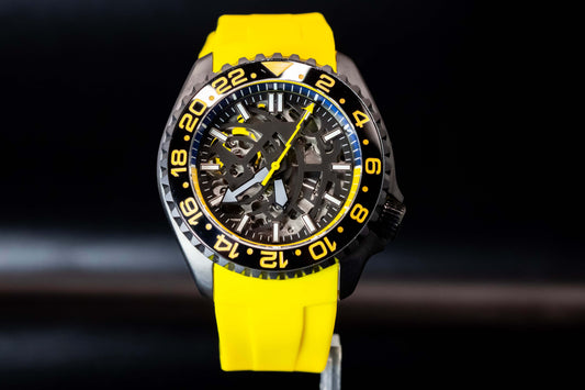 Seikomod Yellow Skeleton SKX watch with a vibrant yellow strap and striking black dial, showcasing its bold design.