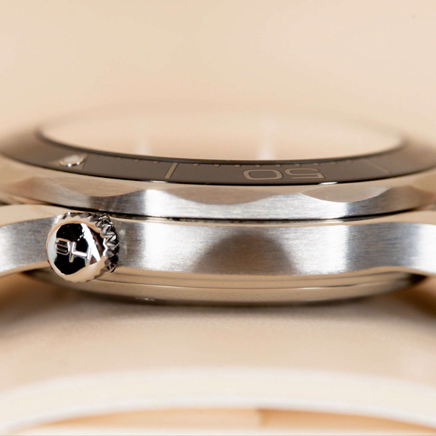 Close-up view of the 2018 Omega Seamaster Diver watch showcasing the watch case and crown.