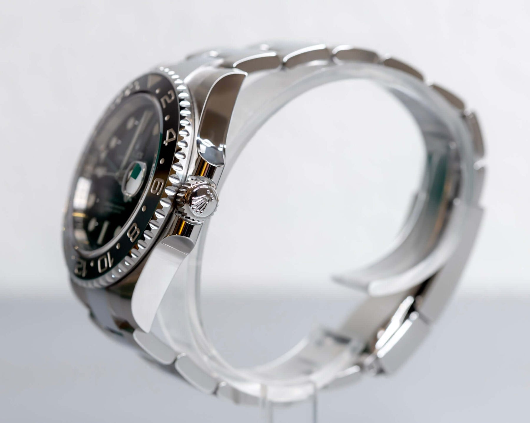 2025 Rolex GMT-Master II Bruce Wayne side view showcasing black and gray Cerachrom bezel and Jubilee bracelet.