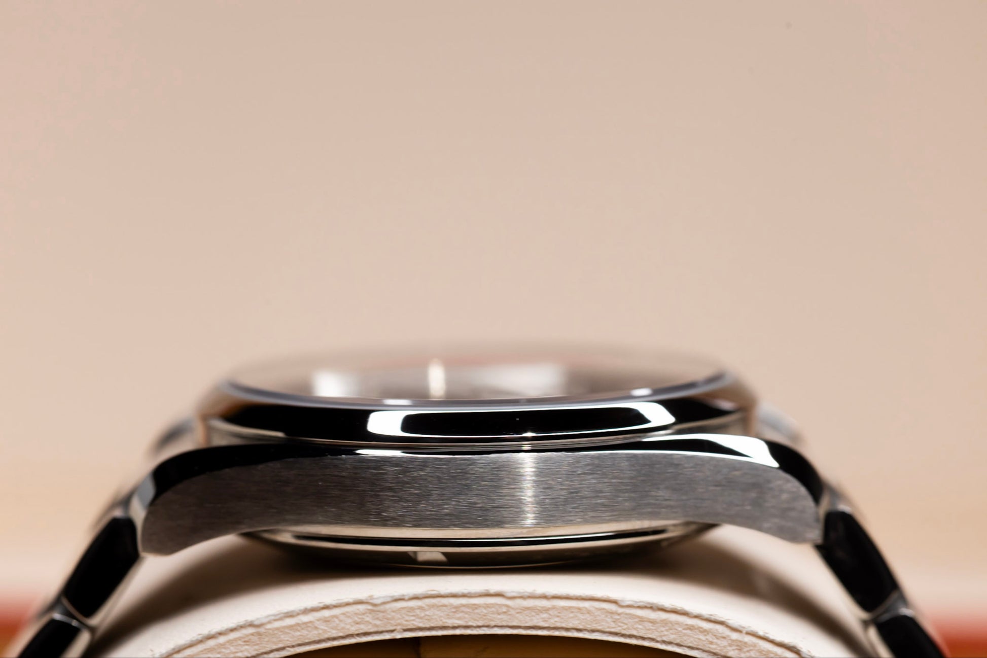 Side view of an Omega Seamaster Aqua Terra watch showcasing its sleek design and polished finish.
