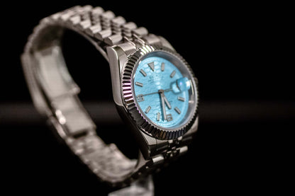 Ice Blue Seiko Mod Land Dweller watch with frosted metallic dial and stainless steel bracelet.
