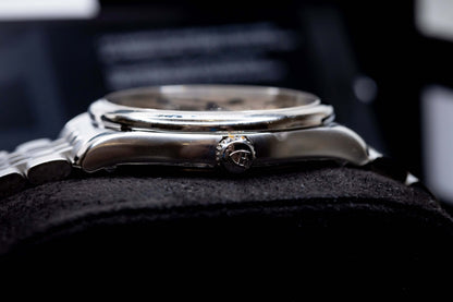 Tudor 1926 Luna 39mm Champagne Dial side view showcasing stainless steel case and crown