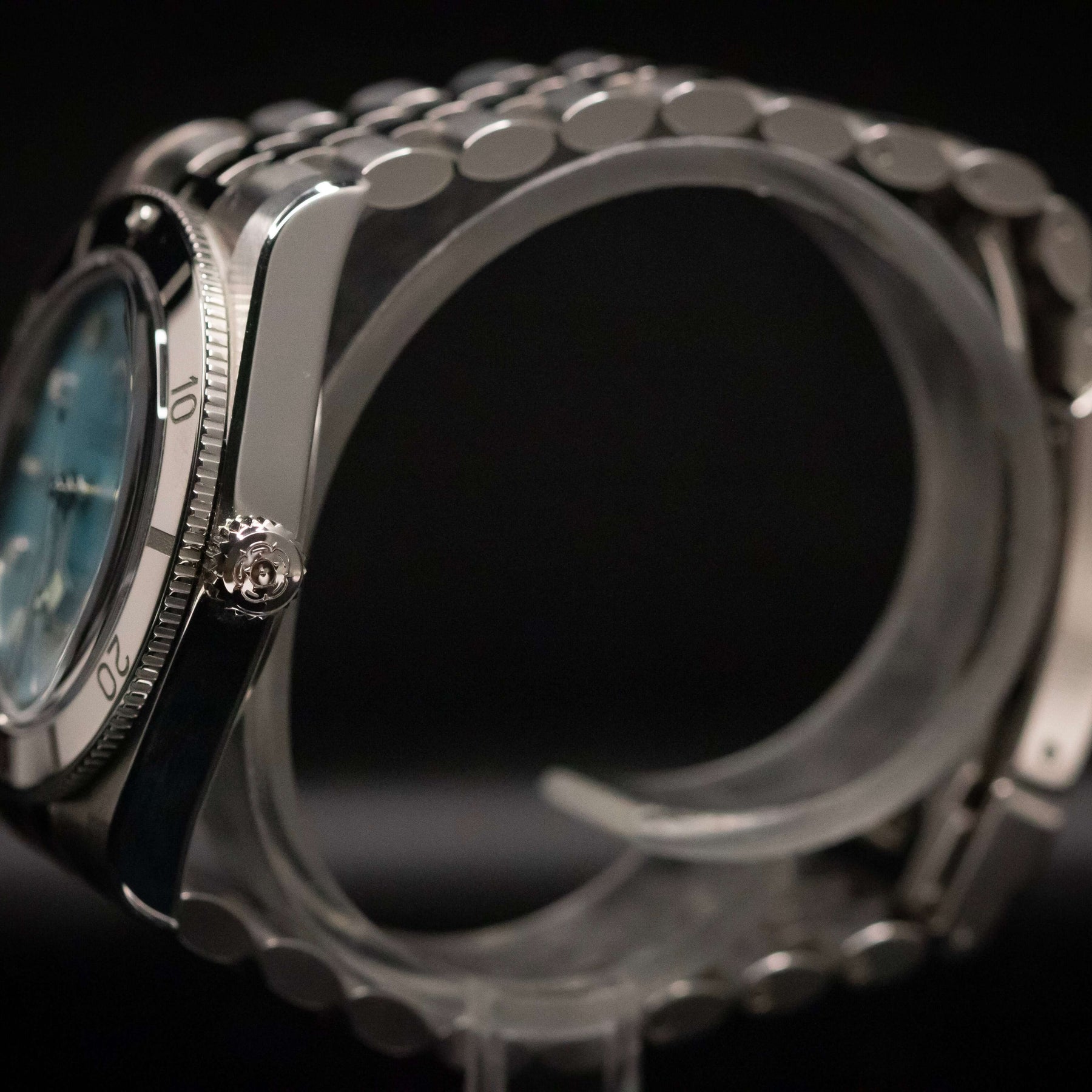Tudor Black Bay 54 Lagoon Blue side view showcasing its mint condition and stunning design features.