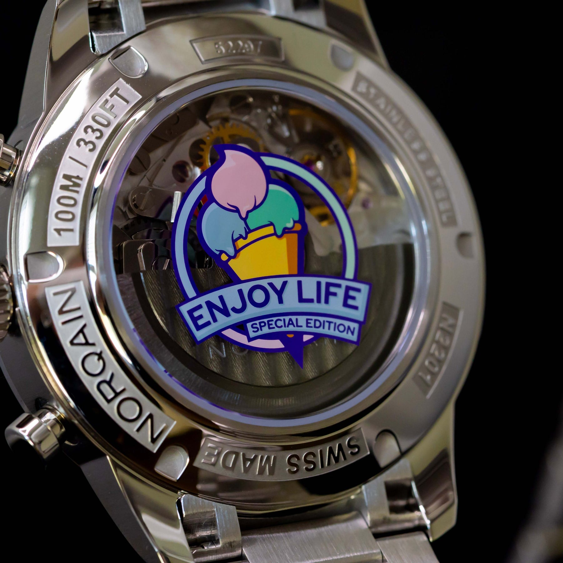 Norqain Freedom 60 Chrono Ice Cream Limited Edition watch back featuring 'Enjoy Life' special logo.