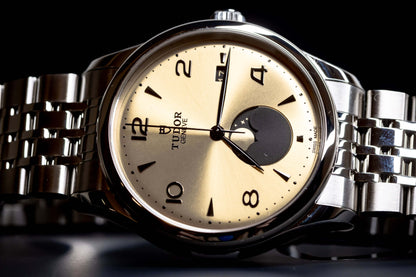 Tudor 1926 Luna 39mm Champagne Dial Stainless Steel watch with moon phase feature.