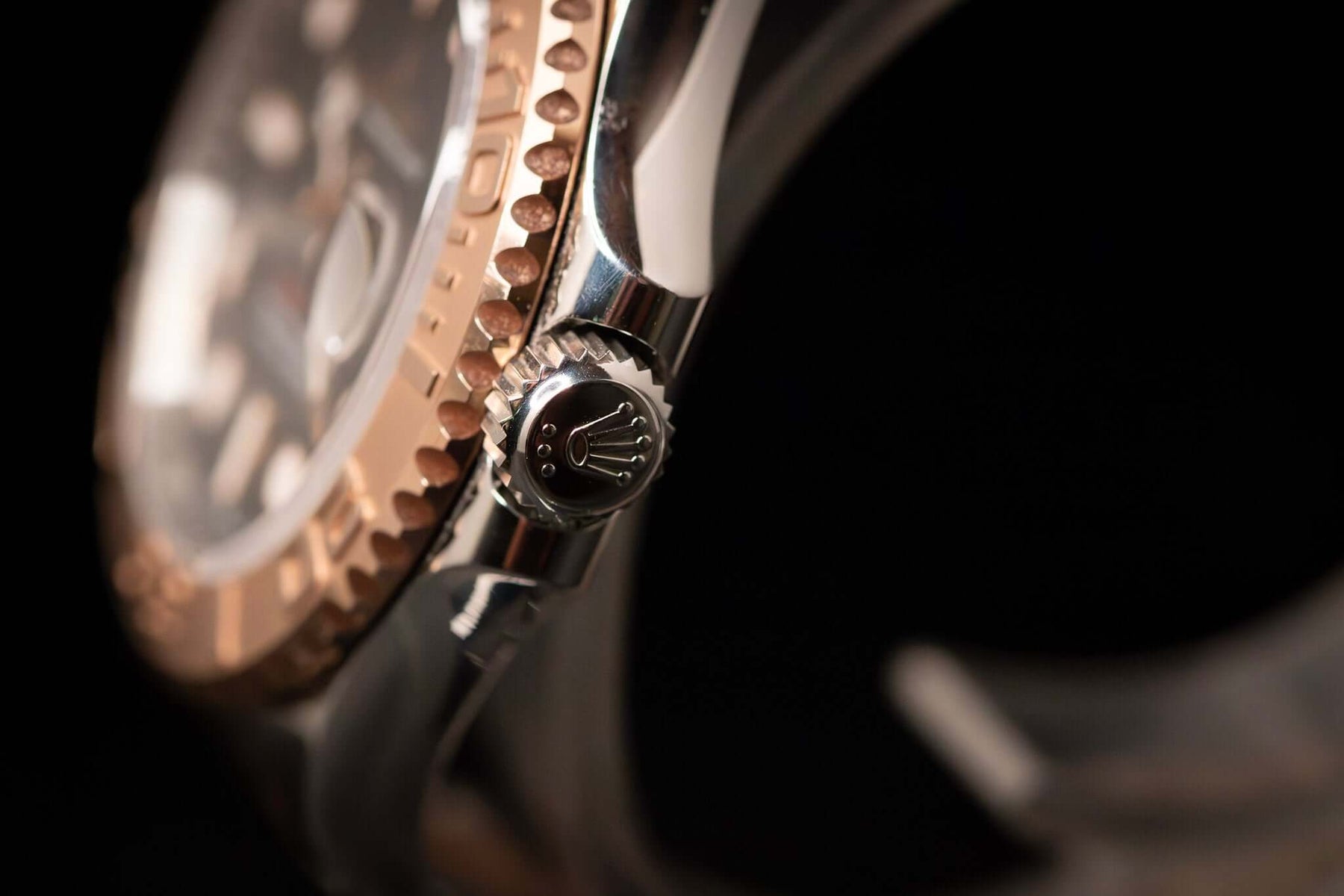 2023 Rolex Yacht-Master 40 watch showing the detailed side view with Everose gold and Oystersteel.