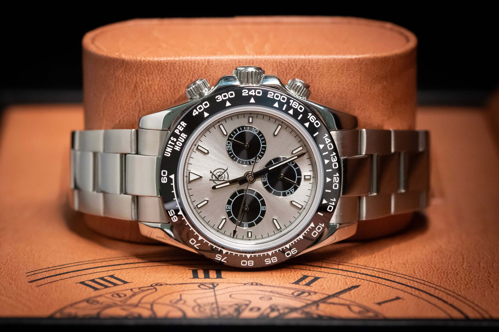 Kingdom 7750 Automatic Chronograph watch with silver dial and stainless steel bracelet, showcasing precision and reliability.