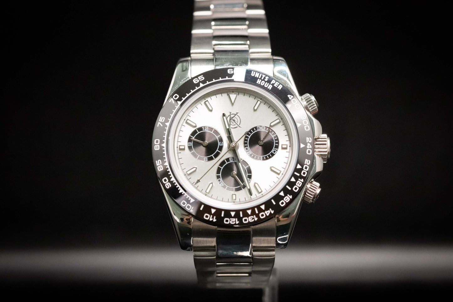 Kingdom 7750 Automatic Chronograph watch with a silver dial and stainless steel bracelet, showcasing precision and style.