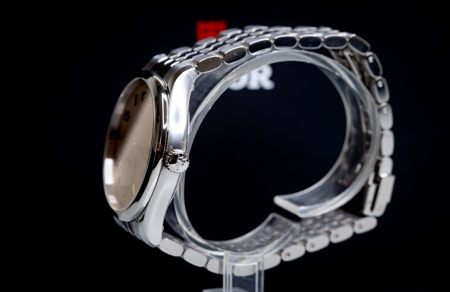 Tudor 1926 Luna 39mm Champagne Dial side view showcasing the stainless steel case and bracelet.