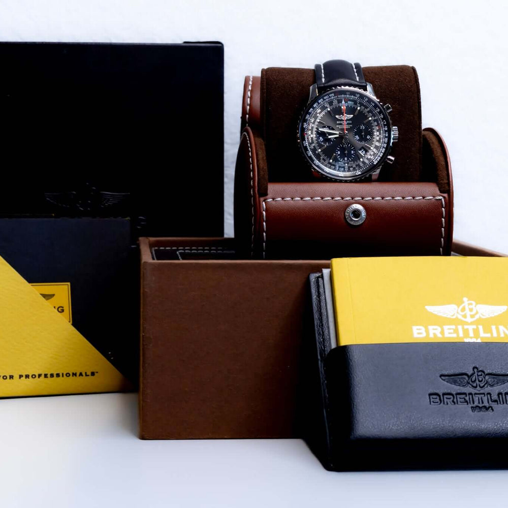 Breitling Navitimer 01 Stratus Gray limited edition watch packaging and accessories displayed.