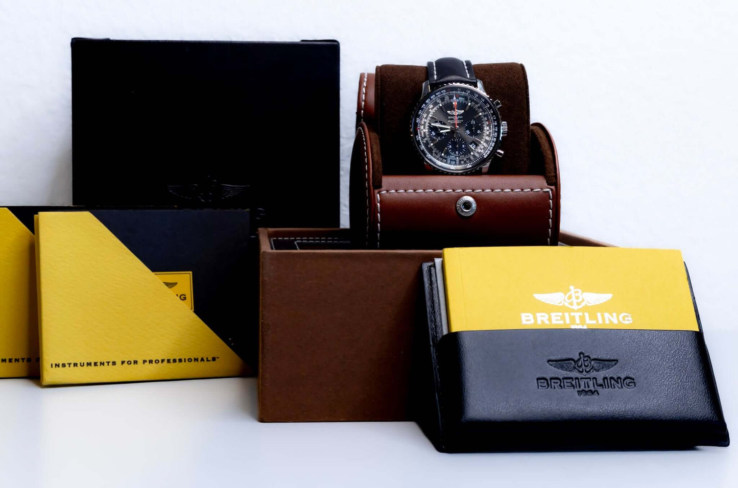 Breitling Navitimer 01 Stratus Gray limited edition watch packaging and accessories displayed.