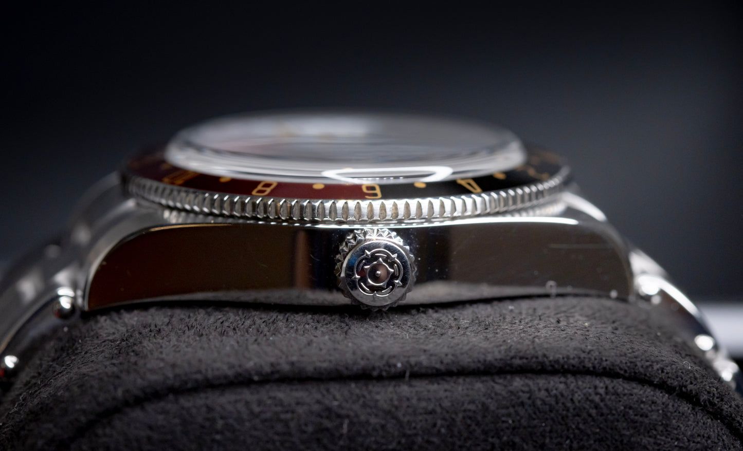 Tudor Black Bay 58 GMT Coke watch side view showcasing the crown and bezel.