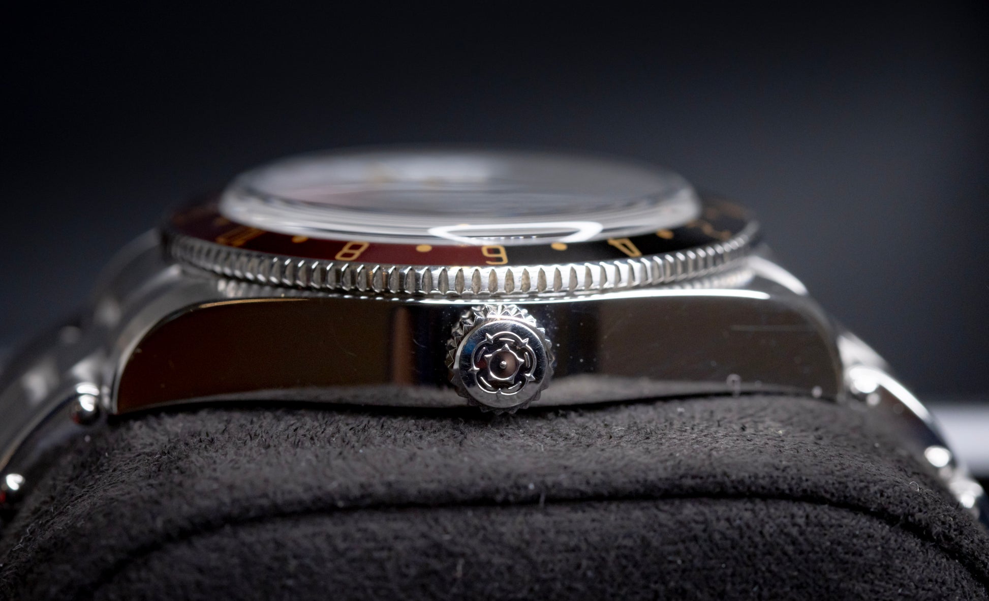 Tudor Black Bay 58 GMT Coke watch side view showcasing the crown and bezel.