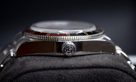 Tudor Black Bay 58 GMT Coke watch side view showcasing the crown and bezel.