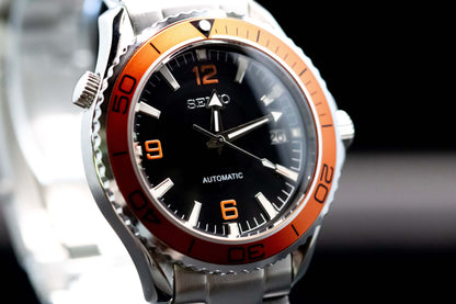 Seiko NH35 Automatic Tiger Seamaster watch featuring black dial, orange numerals, and stainless steel case.