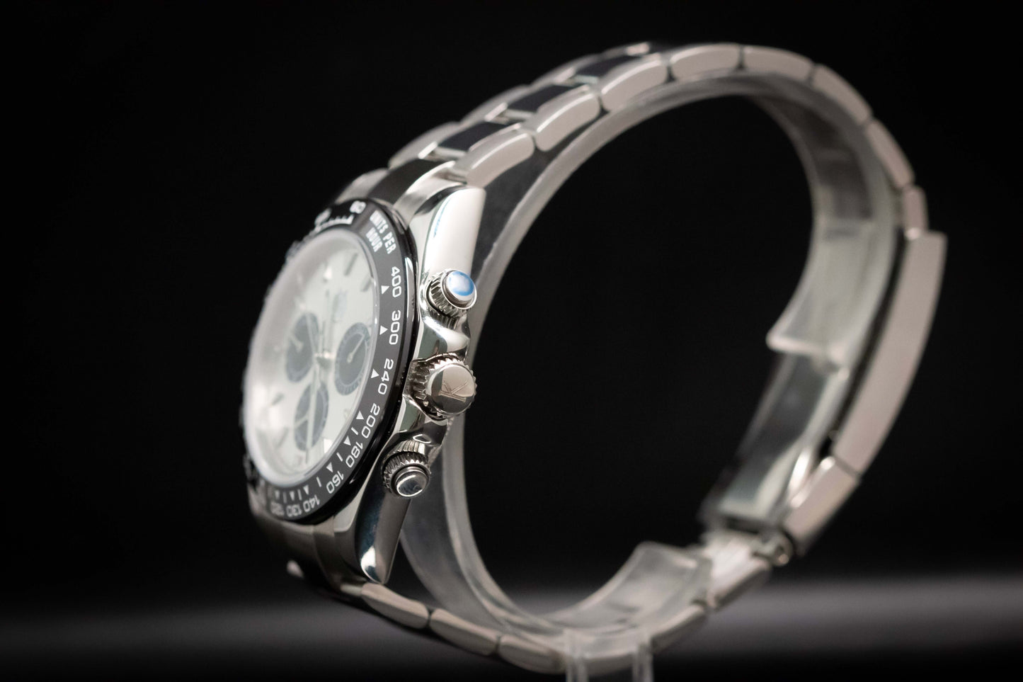 Kingdom 7750 Automatic Chronograph watch side view showcasing stainless steel design and chronograph features.