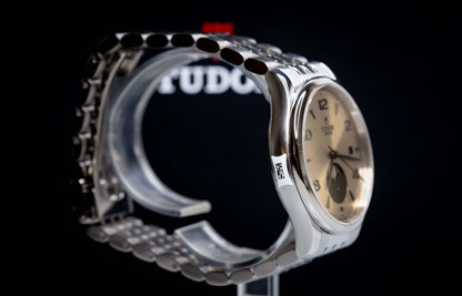 Tudor 1926 Luna 39mm Champagne Dial watch showcasing its stainless steel design and champagne dial detail.