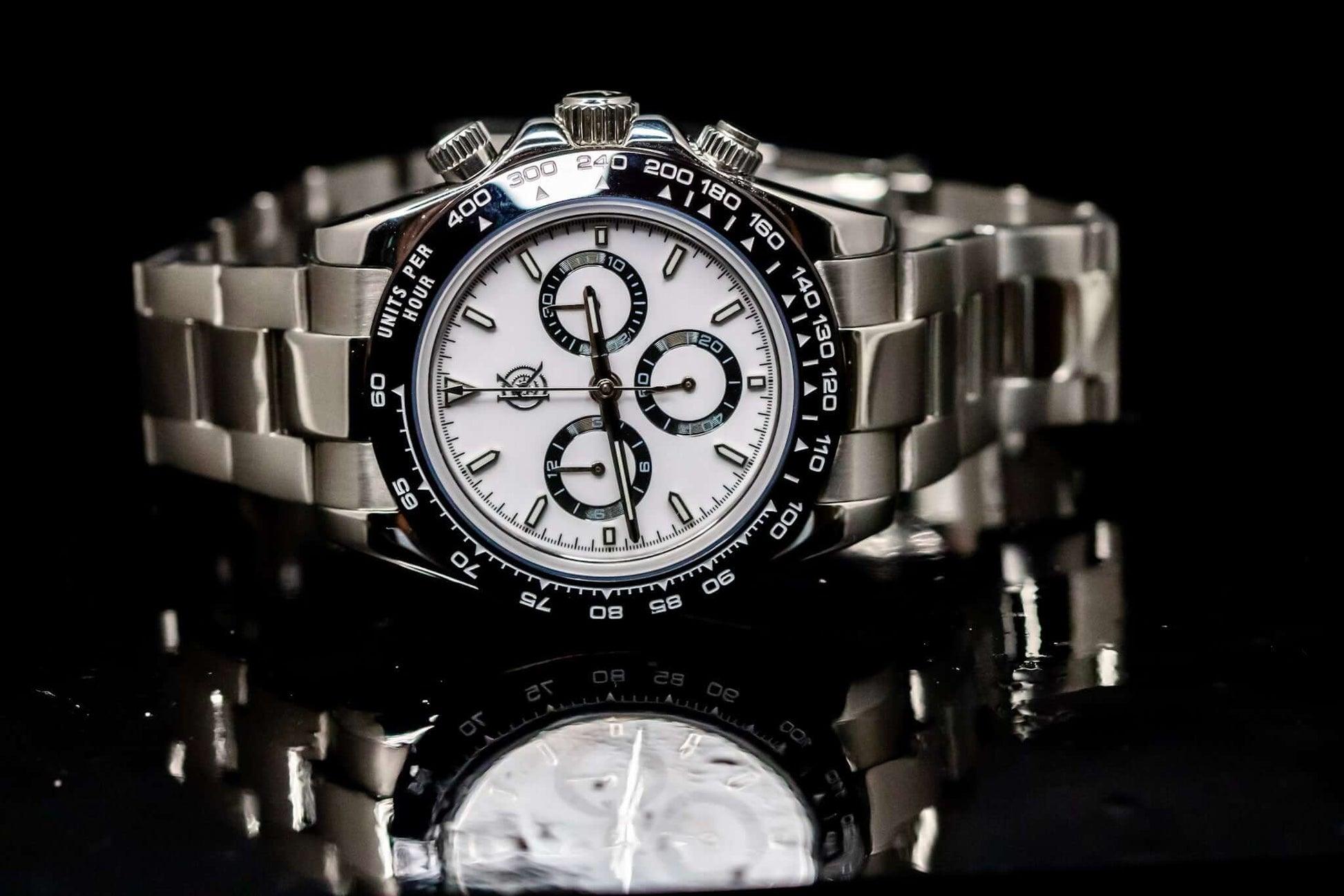 Kingdom 7750 Automatic Chronograph watch with white face and stainless steel bracelet, showcasing Swiss precision and durability.