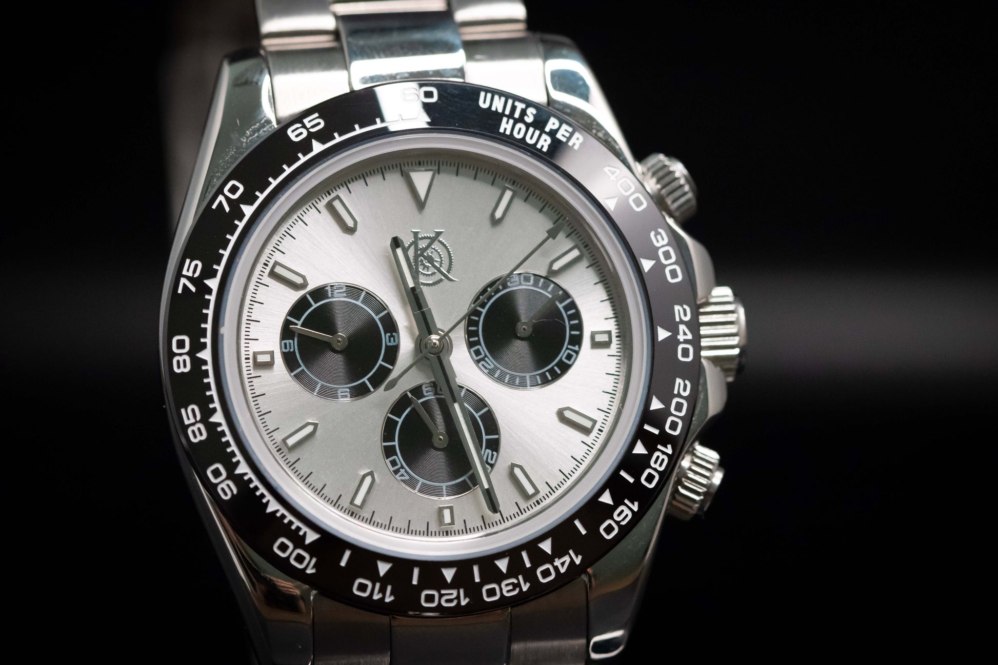 Kingdom 7750 Automatic Chronograph watch featuring silver dial and stainless steel bracelet.