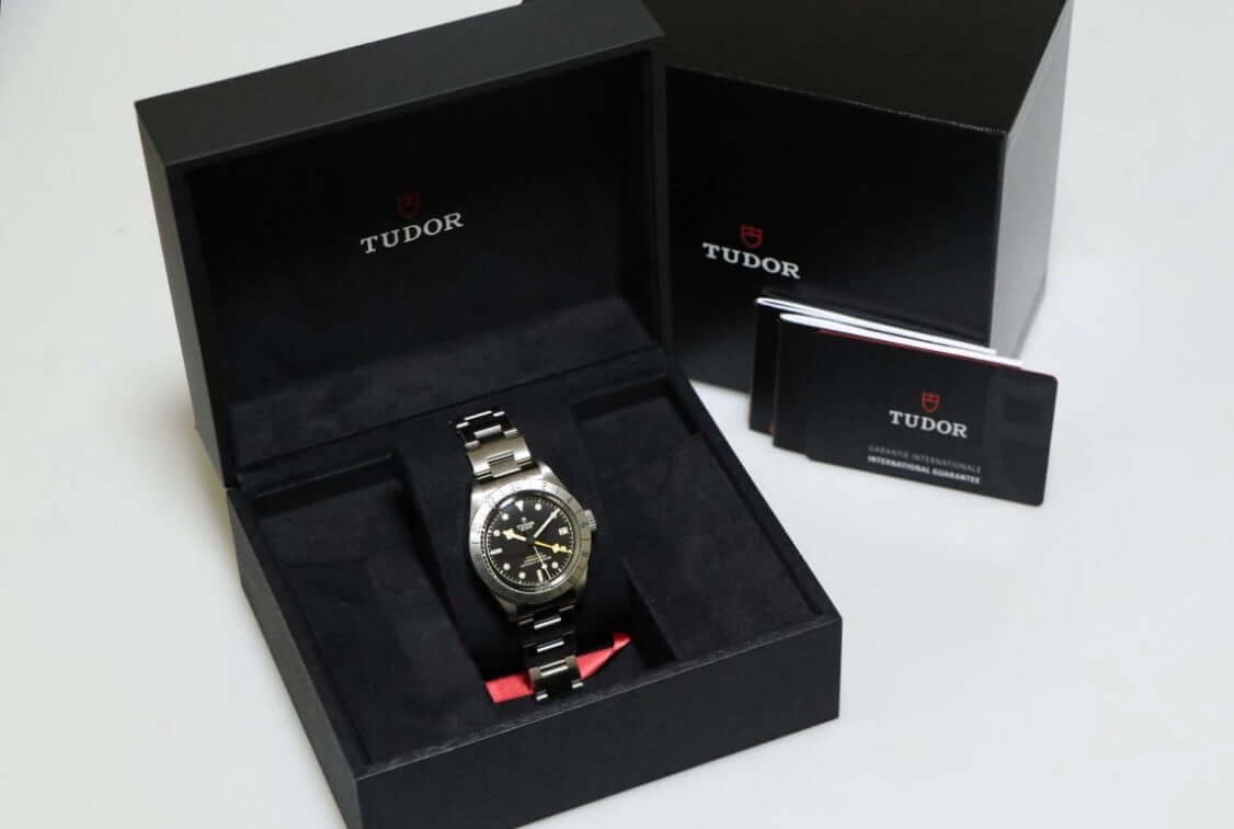Tudor Black Bay Pro review - luxury watch displayed in its box with card and warranty.
