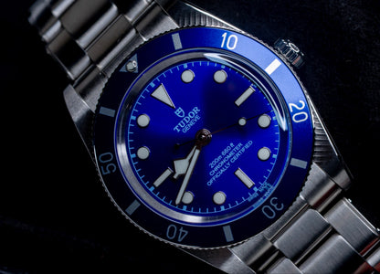 Close-up of the 2026 Tudor Black Bay watch featuring a blue dial and stainless steel bracelet.