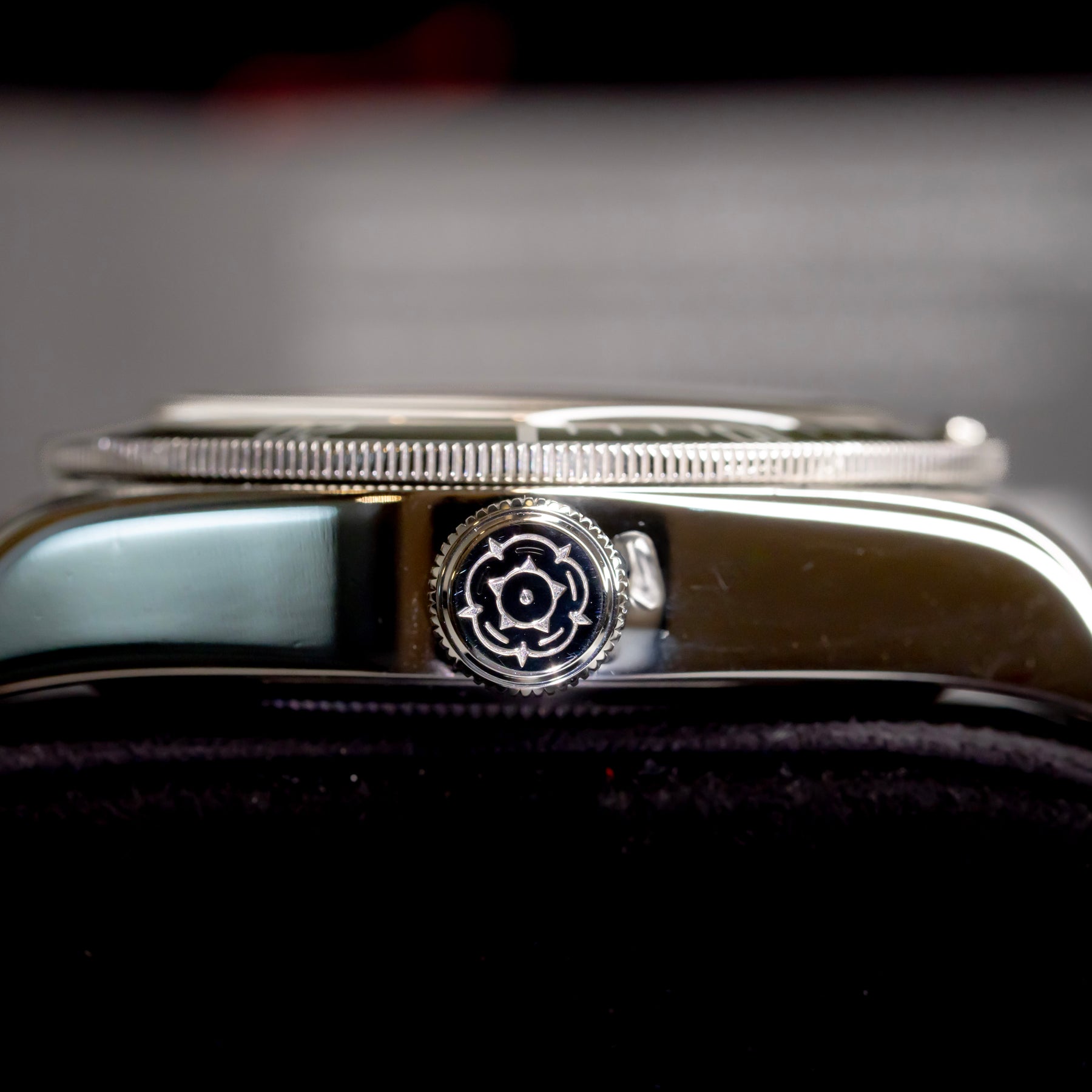 Tudor Black Bay Harrods Edition 41mm watch showcasing the side view with intricate crown detail.