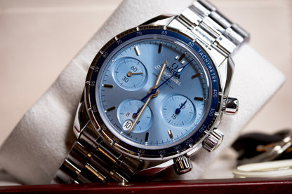 Omega Speedmaster Chronograph 38 review featuring a blue dial and stainless steel case.