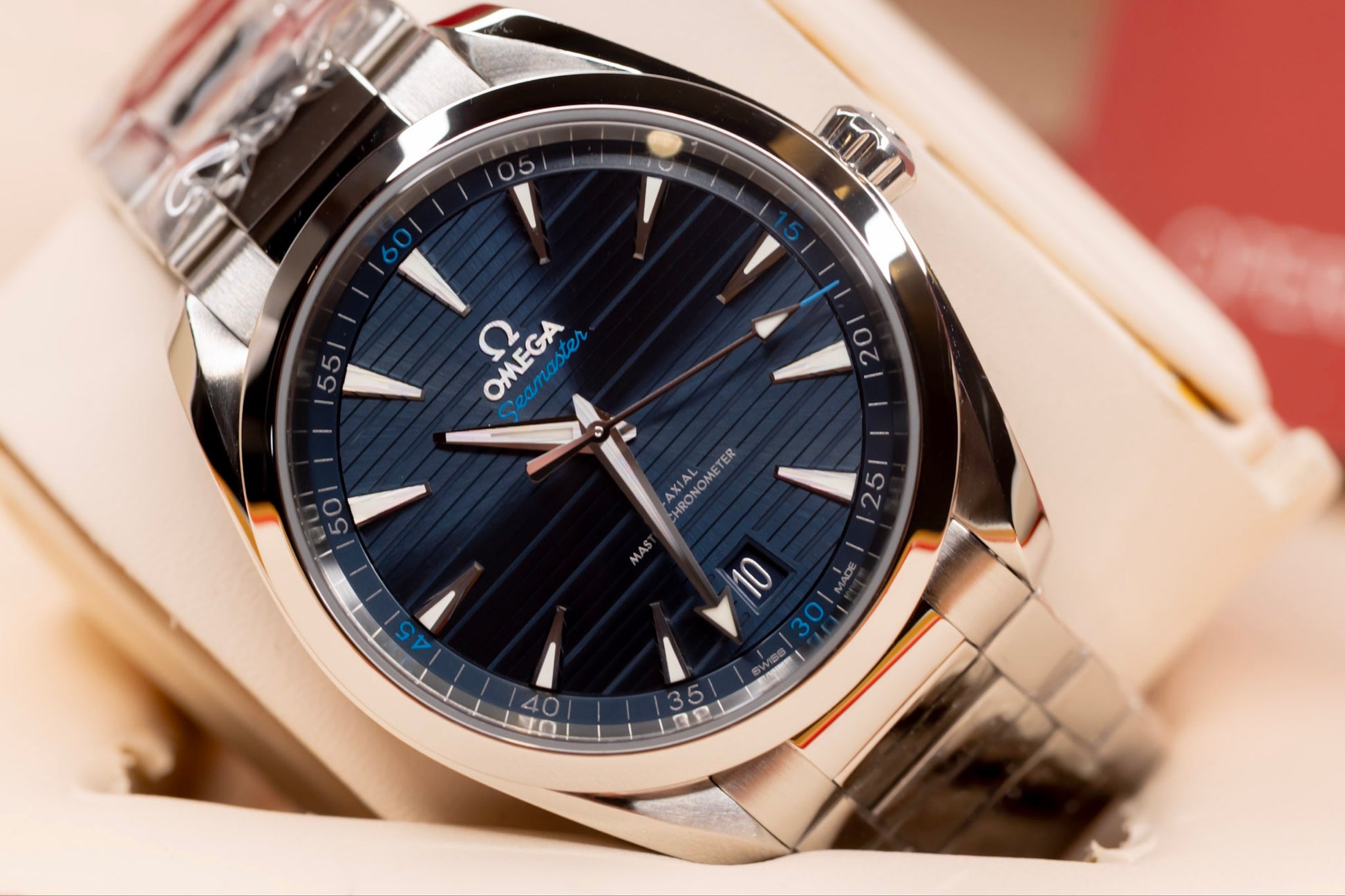 Omega Seamaster Aqua Terra 41mm watch with blue dial and stainless steel case, showcasing luxury and precision.