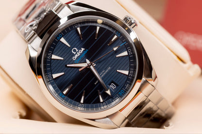 Omega Seamaster Aqua Terra 41mm watch with blue dial and stainless steel case, showcasing luxury and precision.