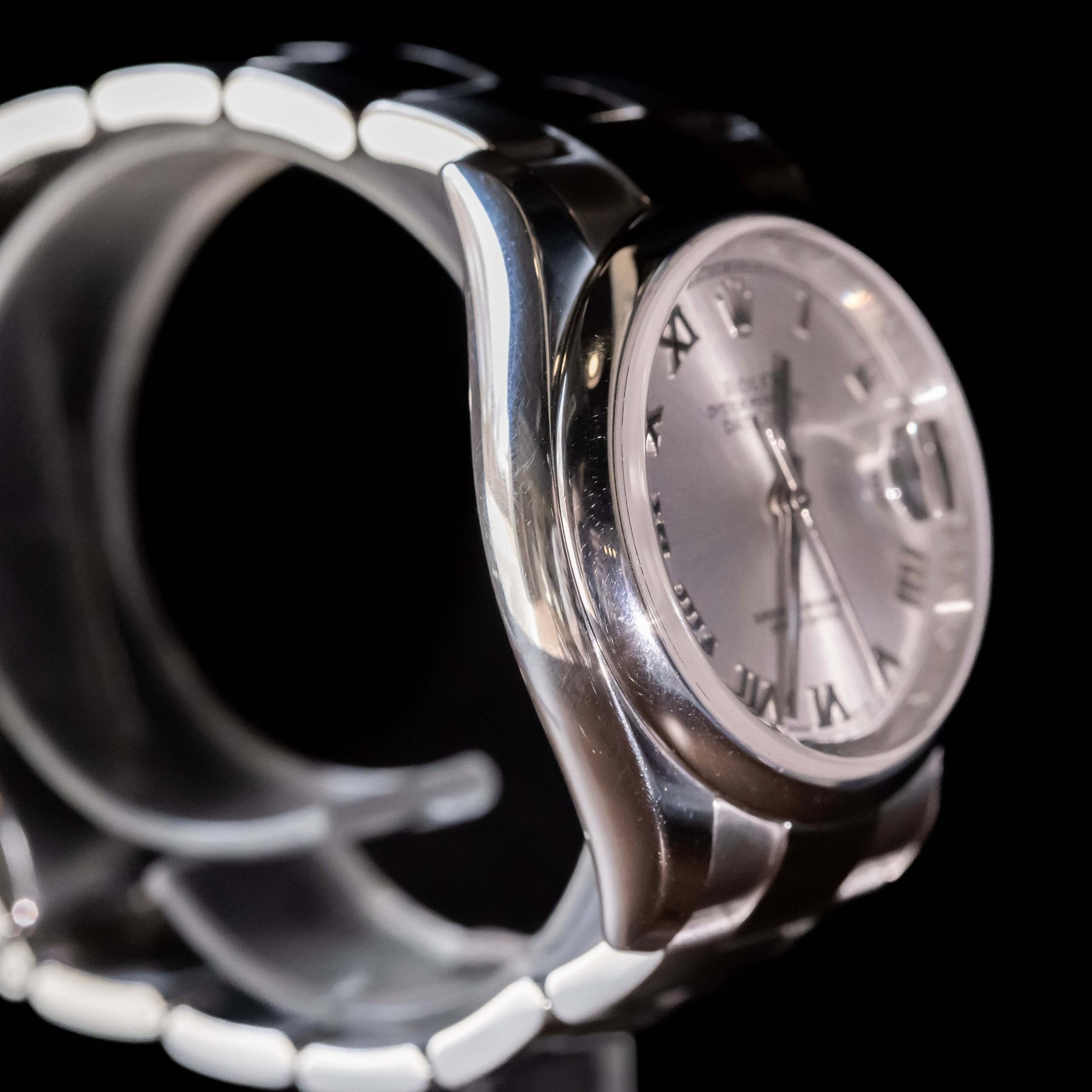 Rolex Datejust 36 full set showcasing the silver dial and Oystersteel case with Roman indices.