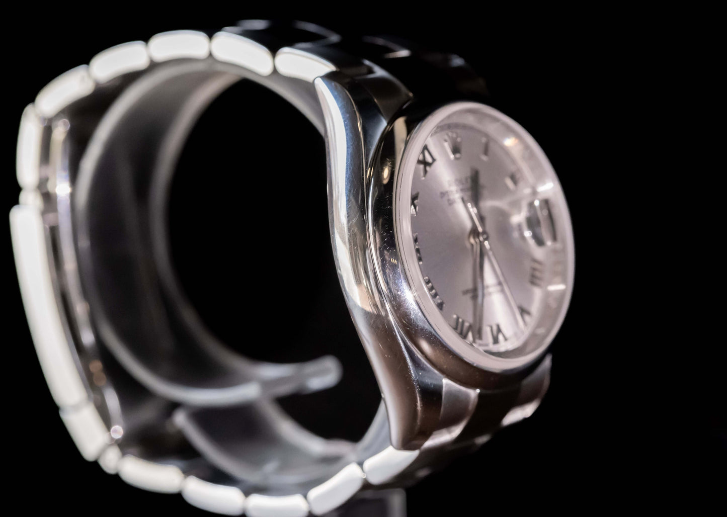 Rolex Datejust 36 full set showcasing the silver dial and Oystersteel case with Roman indices.