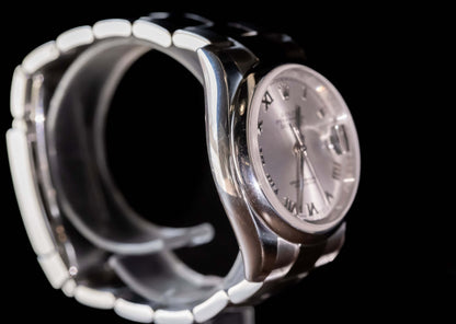 Rolex Datejust 36 full set showcasing the silver dial and Oystersteel case with Roman indices.