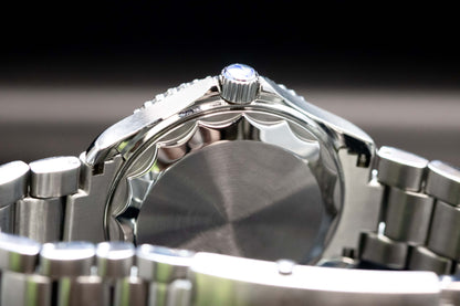 Close-up of the Seikomod Tiger Seamaster watch case showcasing the stainless steel design and intricate details.