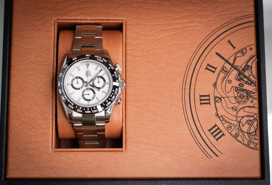 Kingdom 7750 Automatic Chronograph watch with stainless steel bracelet in elegant packaging.