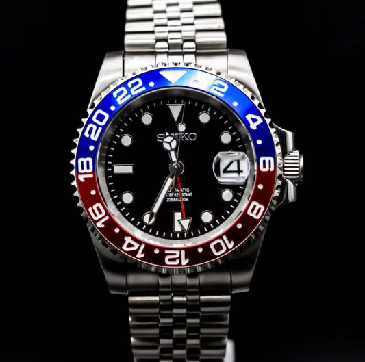 Seiko NH35 Automatic GMT-II Pepsi watch with adjustable Jubilee bracelet and unique aftermarket dial.