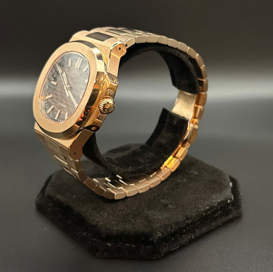 Angled shot of SeikoMod Rose Gold Nautilus showcasing integrated bracelet and case design