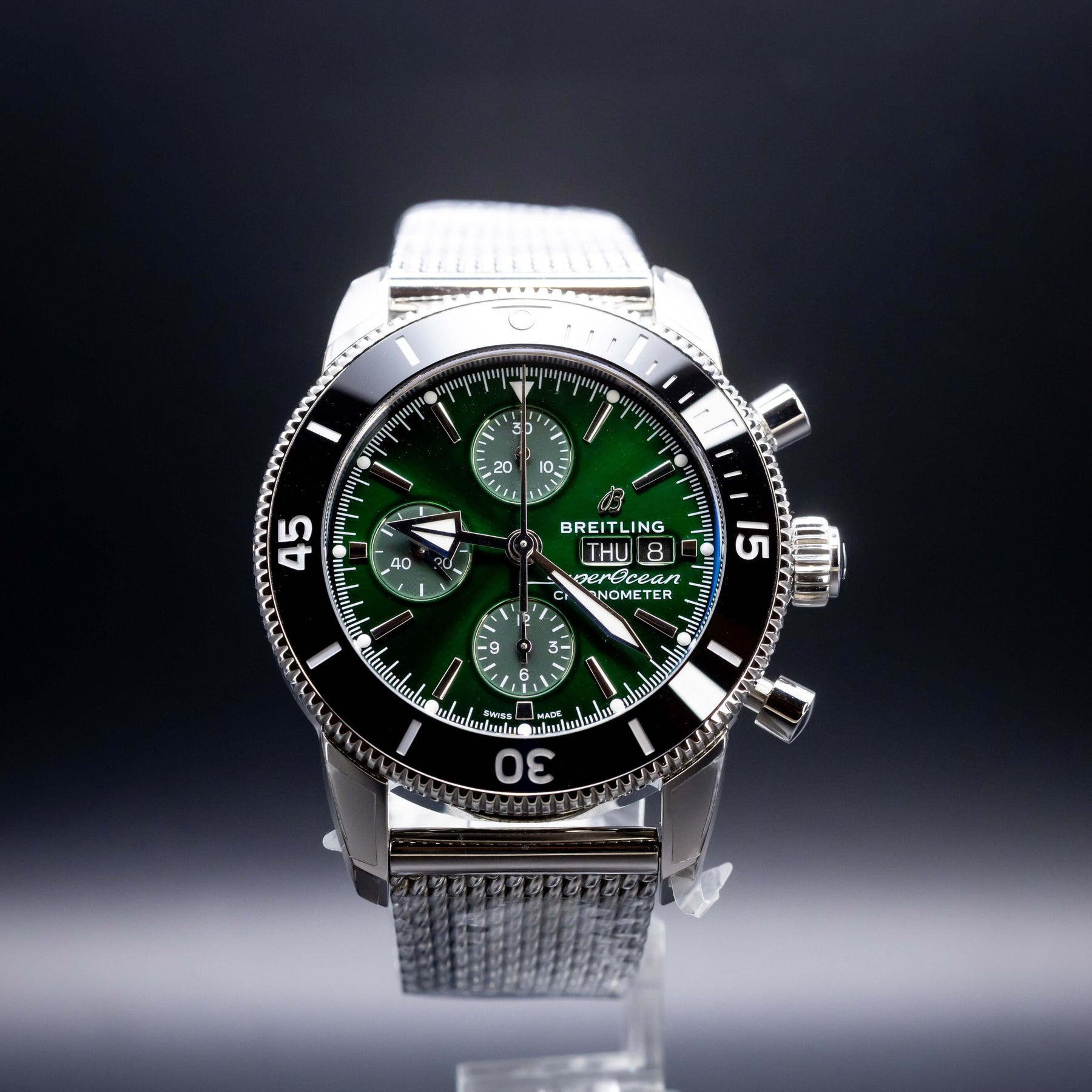 2025 BNIB - Breitling SuperOcean Chronograph Green 44mm- Breitling A13313 wristwatch on display with green dial.