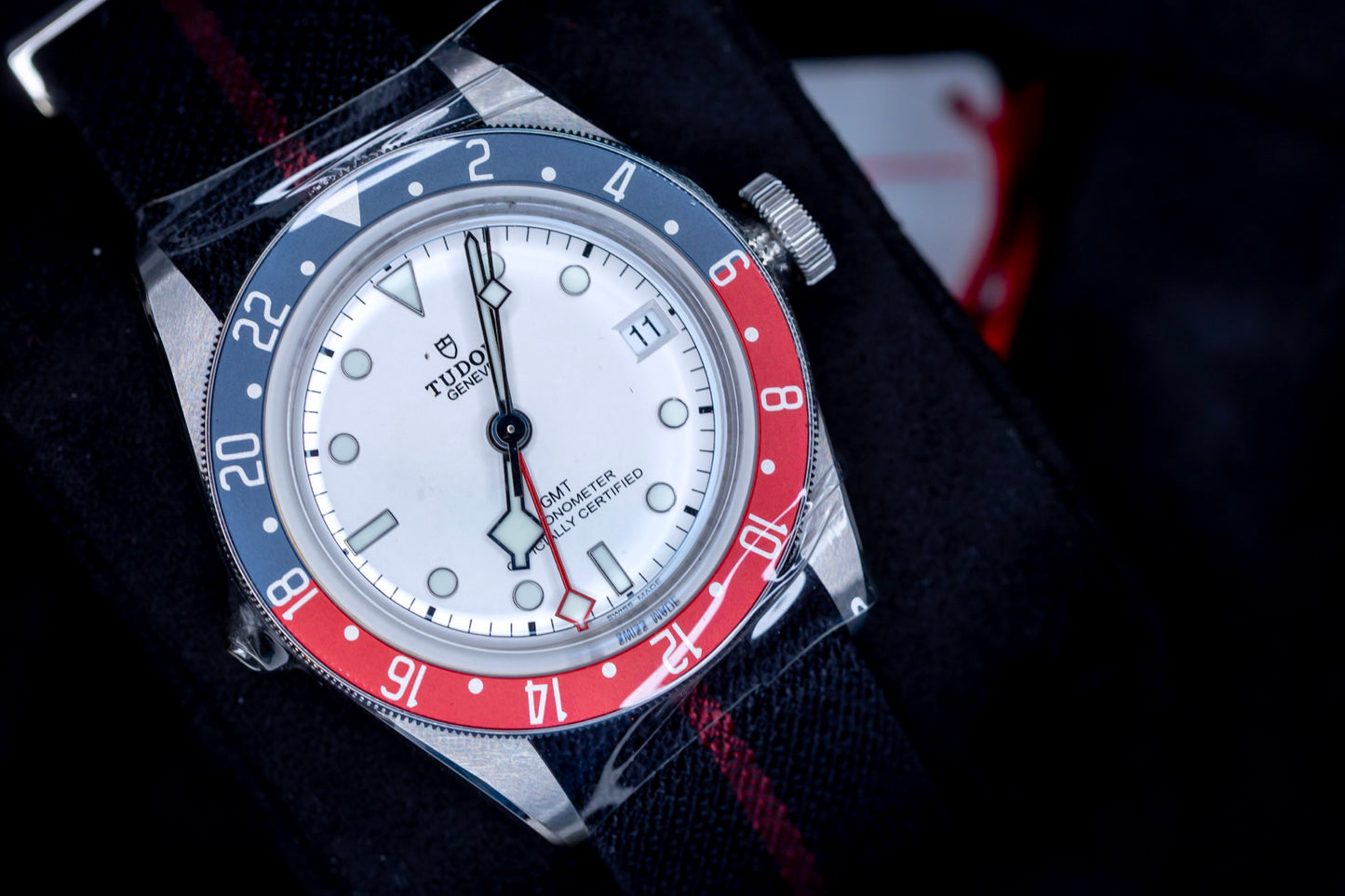 Tudor Black Bay GMT Pepsi watch featuring an opaline dial and a burgundy-and-blue bezel