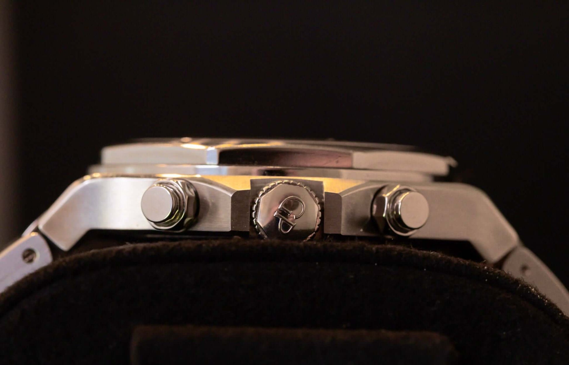 Girard Perregaux Laureato Chronograph 42mm Limited Edition watch side view showcasing stainless steel case and chronograph buttons.