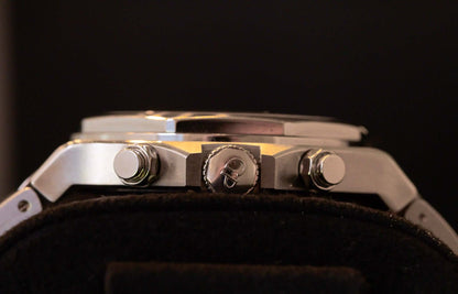 Girard Perregaux Laureato Chronograph 42mm Limited Edition watch side view showcasing stainless steel case and chronograph buttons.