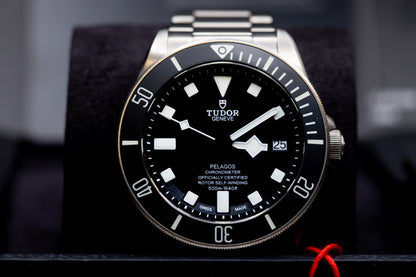 Tudor Pelagos dive watch featuring 500-meter water resistance and titanium bracelet for extreme underwater conditions.
