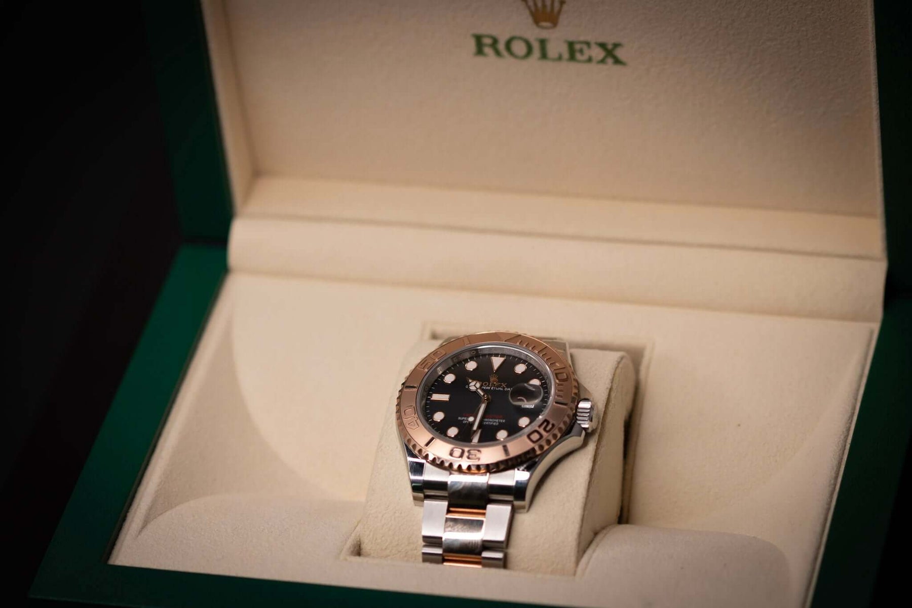 2023 Rolex Yacht-Master 40 watch in a luxury box featuring Everose Gold and Oystersteel with a black dial.