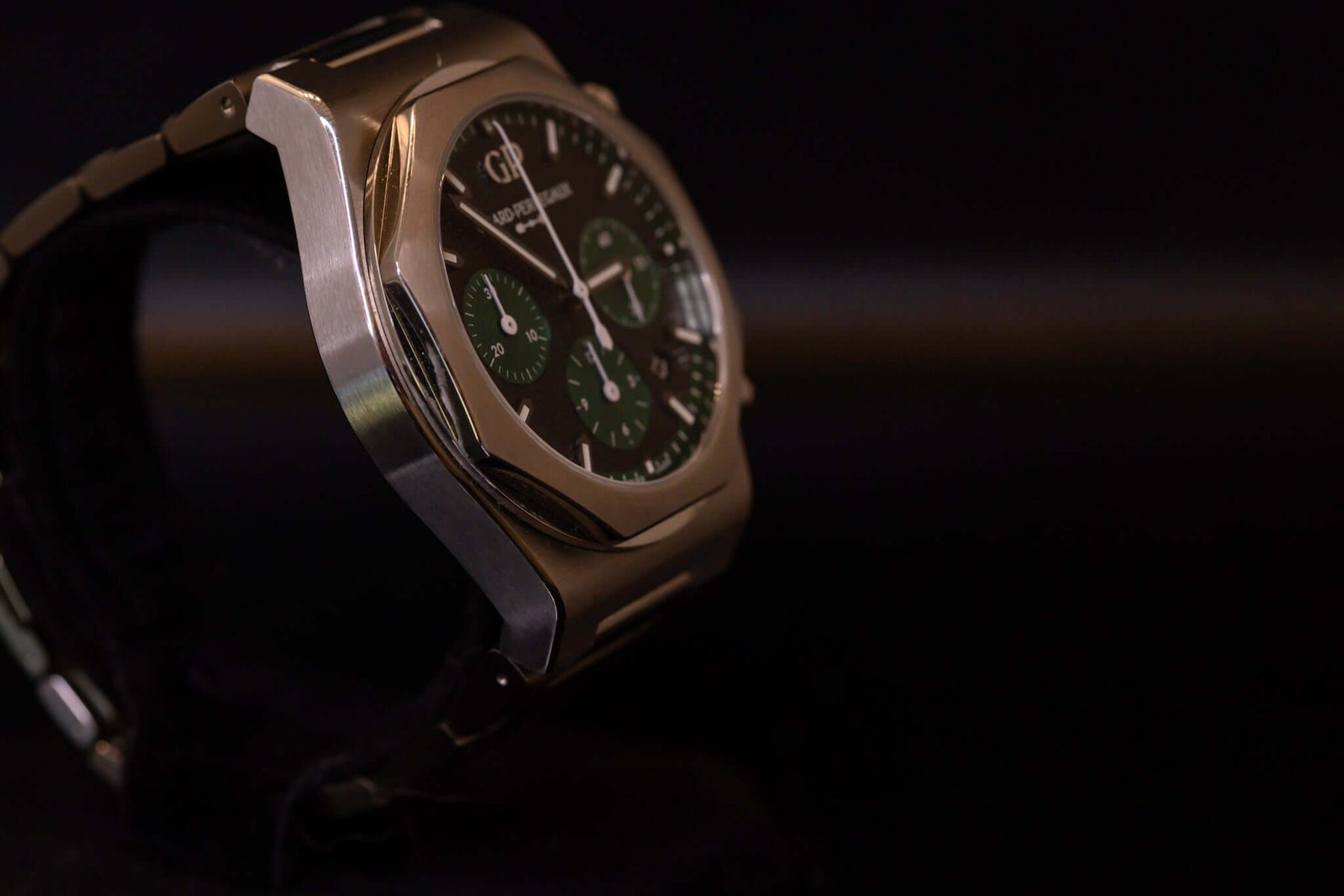 Girard Perregaux Laureato Chronograph 42mm Limited Edition showcasing black waffle dial and green subdials.